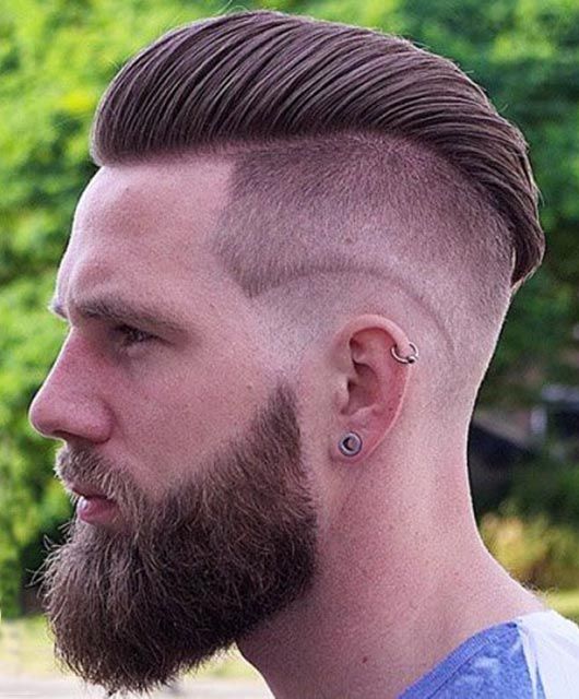 "A sophisticated and preppy undercut hairstyle fade that combines the classic Ivy League side-parted look with a modern, clean fade for a polished and professional finish."
