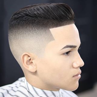 "An artistic undercut hairstyle fade featuring a unique double line hair design etched into the side, adding a modern and edgy flair to the clean fade."