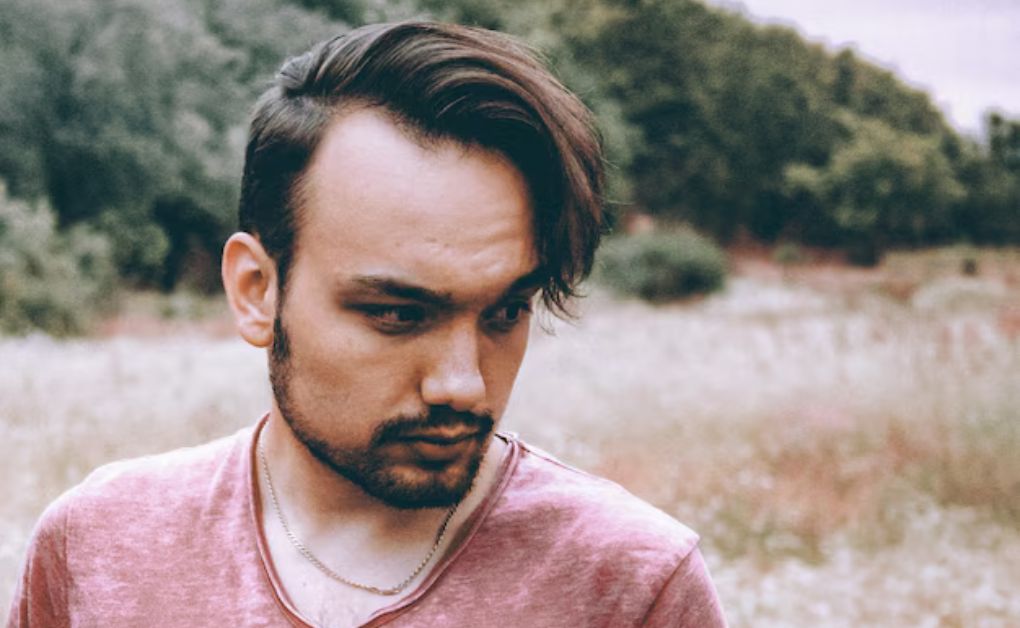 "Low Fade Haircut: 33 Stylish Looks & Expert Grooming Tips" Textured crop top with a clean low fade