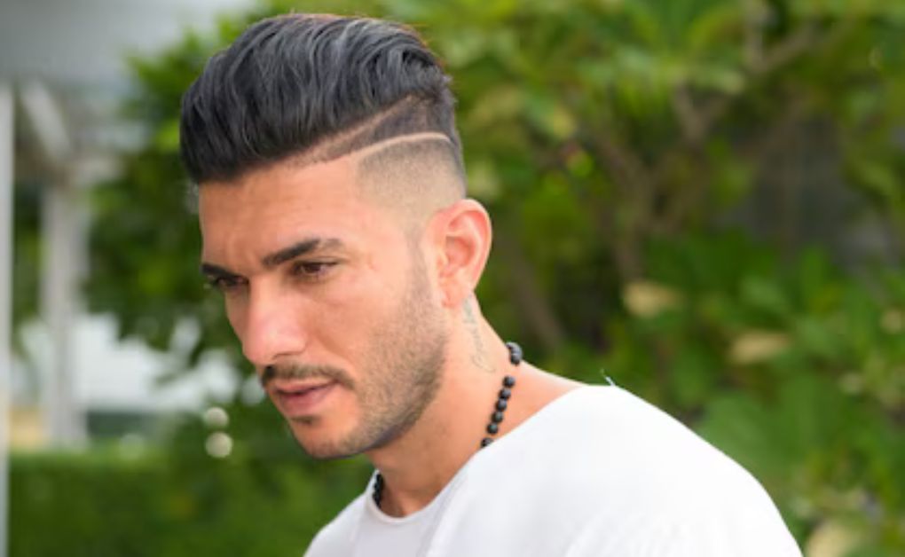 "Low Fade Haircut: 33 Stylish Looks & Expert Grooming Tips" Minimalist buzz cut with low fade transition