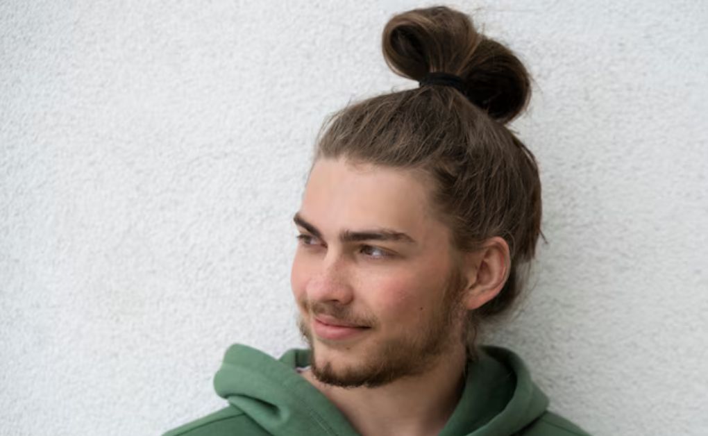 "Low Fade Haircut: 33 Stylish Looks & Expert Grooming Tips" Top knot hairstyle with low skin fade