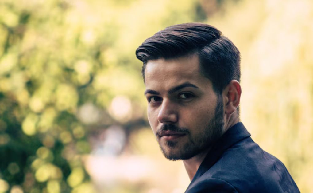 "Low Fade Haircut: 33 Stylish Looks & Expert Grooming Tips" Low temple fade focusing on sideburns