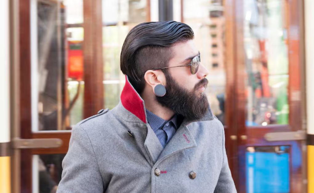 Skin Fade Haircut: 35 Iconic Styles & Grooming Tips for Men Skin Fade Man Bun (Undercut Fade)