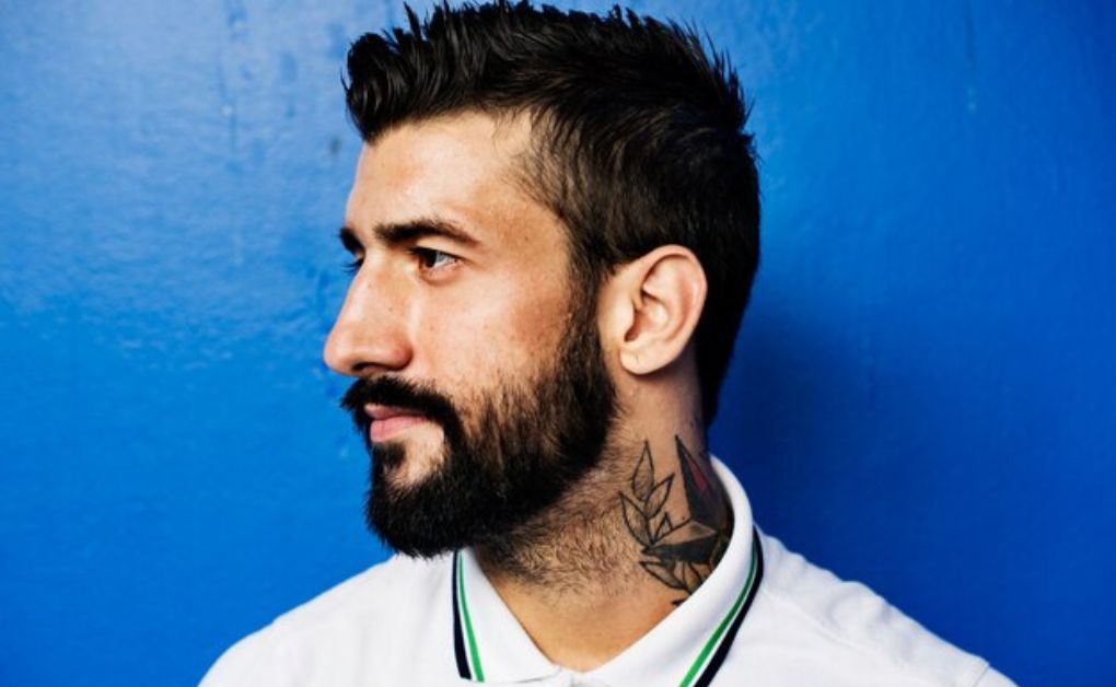 "Low Fade Haircut: 33 Stylish Looks & Expert Grooming Tips" Sharp low skin fade haircut with bald finish