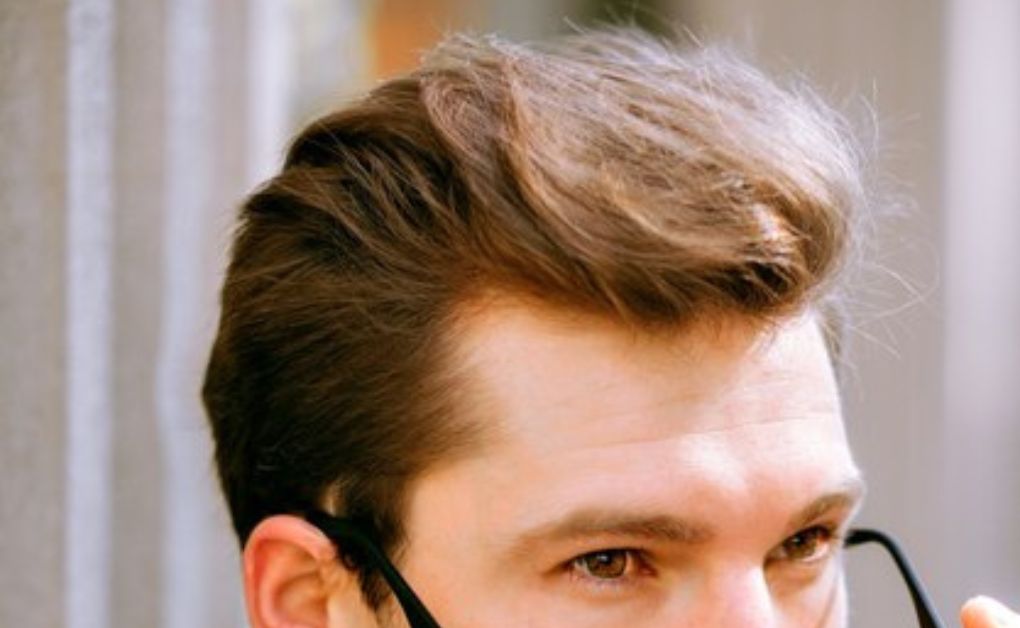 "Low Fade Haircut: 33 Stylish Looks & Expert Grooming Tips" Conservative low taper fade with natural hairline
