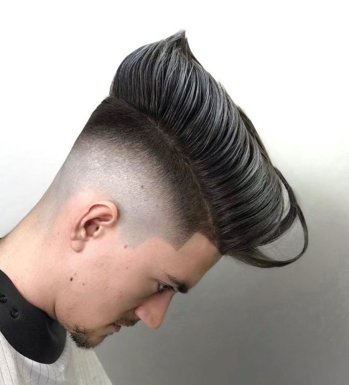 "A specialized undercut hairstyle fade technique that uses strategic layering and a high-contrast side fade to create the illusion of thickness and movement for naturally flat hair."