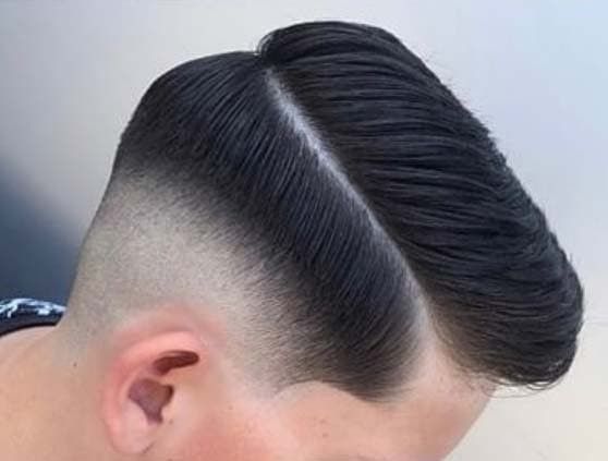 Skin Fade Haircut: 35 Iconic Styles & Grooming Tips for Men Textured Quiff with sharp Skin Fade