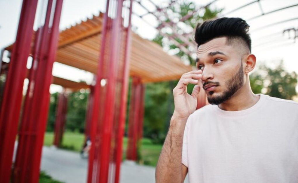 Sharp temple fade (temp fade) for men, focusing on a clean taper around the temples and sideburns.