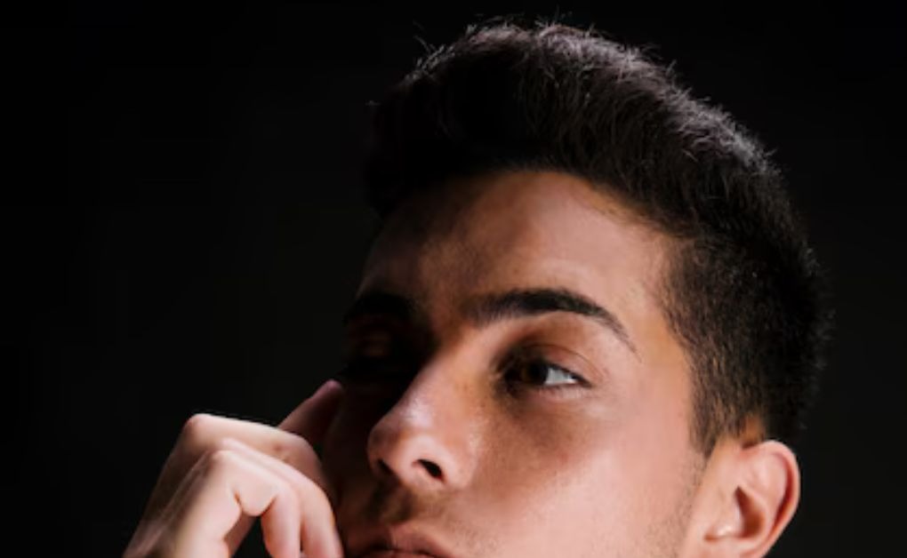 "A bold and clean Barber Style featuring a high skin fade that blends seamlessly into the scalp, emphasizing the volume and texture on top."