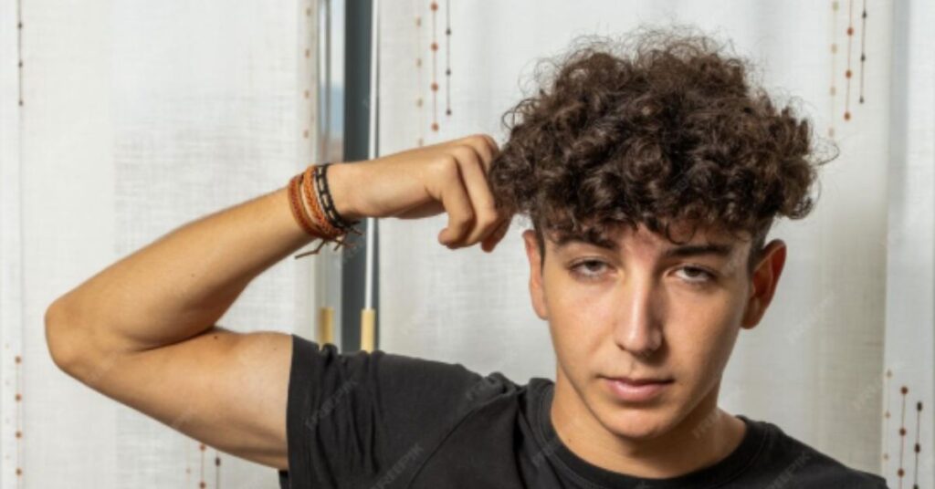 curly drop fade with etched lines